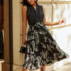 Чорна спідниця-міді в зелений принт | 69400