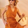 Розкльошена сукня міні помаранчева в горох | 89749