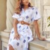 Літня розкльошена сукня-сорочка біла в принт | 90476