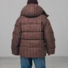 Зимовий пуховик oversize у смужку коричневий | 100845